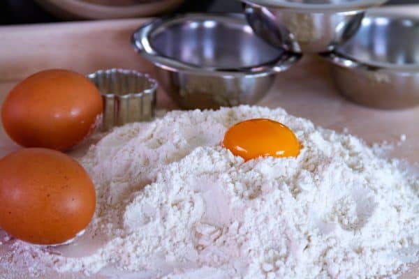Fresh eggs are used to emulsify cookie batter, adding consistency and healthy fat content.